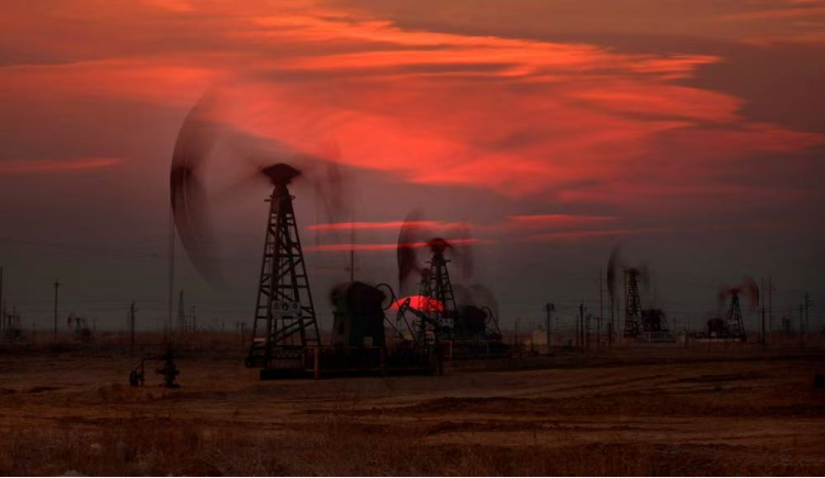 Oilfield at sunset